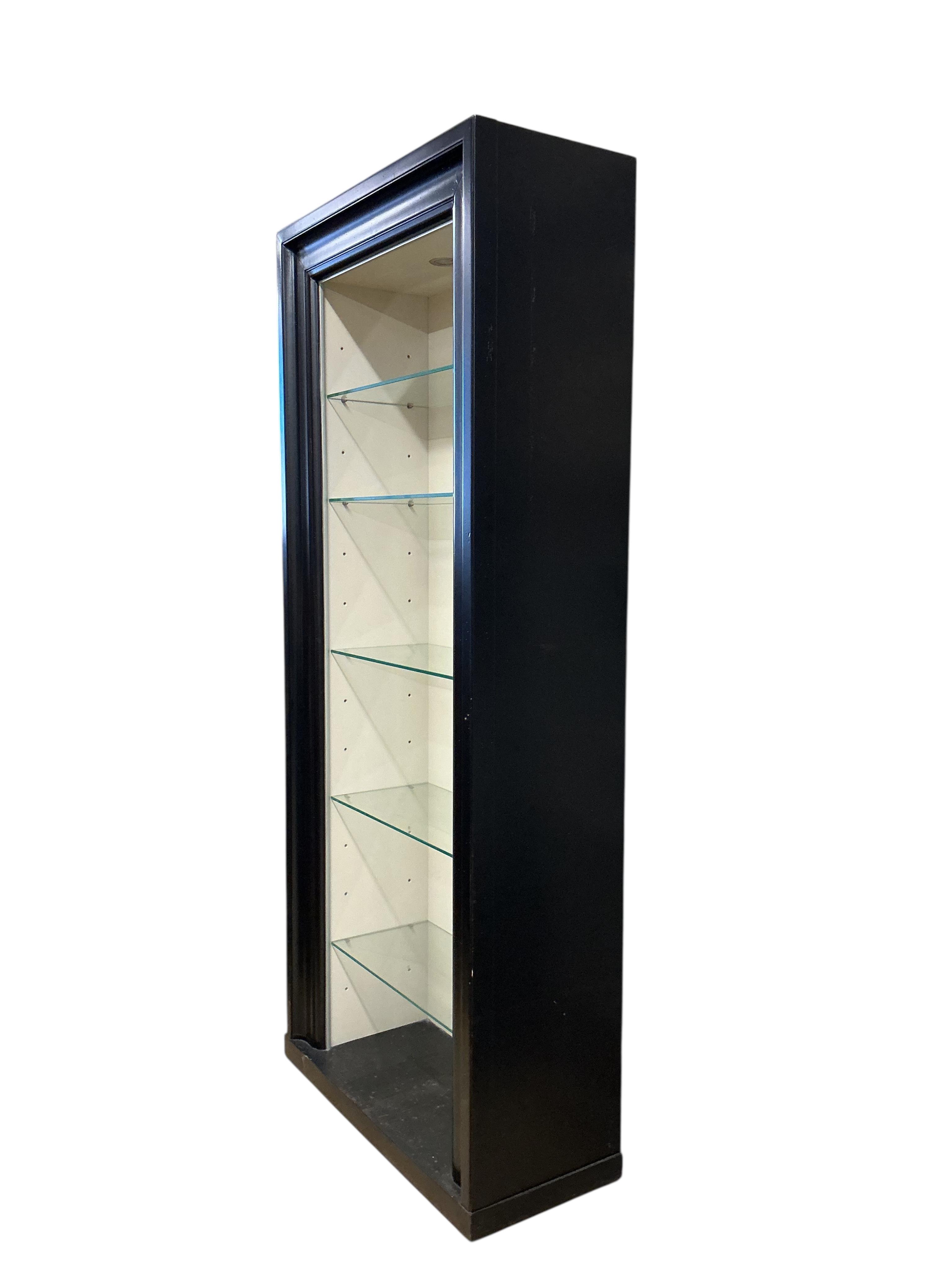 A pair of contemporary ebonised open display units, width 92cm, depth 39cm, height 217cm